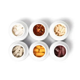 Kapseln in offener Verpackung